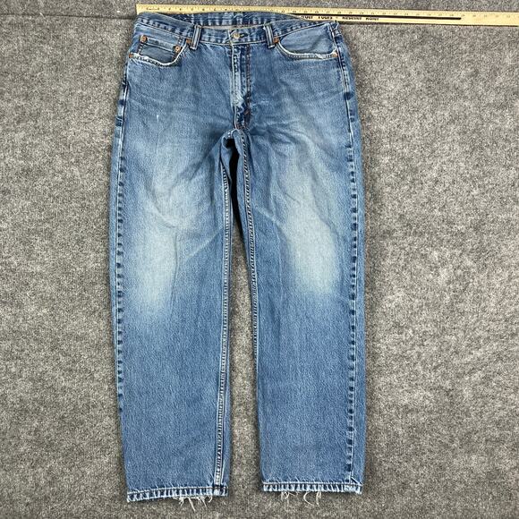 Levi's 550 Jeans Mens Size 36x32 Blue Relaxed Fit Tapered Leg Distressed Hem - Picture 1 of 11